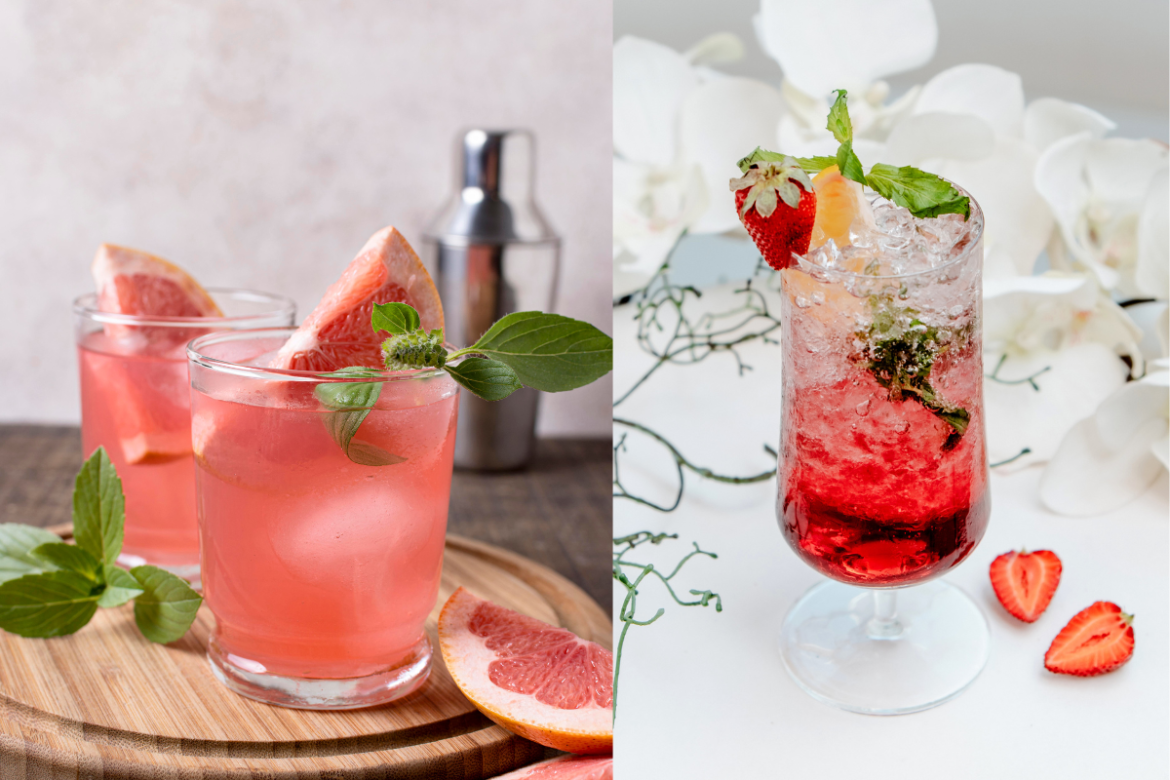 Drinks sem álcool. À esquerda, dois copos de coquetel rosa claro de toranja com gelo e ramos de hortelã, acompanhados de fatias de toranja e uma coqueteleira. À direita, um copo alto de coquetel vermelho vibrante com gelo picado, morangos, folhas de hortelã e uma fatia de laranja, sobre um fundo branco com orquídeas.
