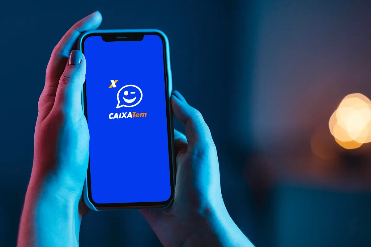 Como liberar o uso da conta Pé-de-Meia para seus filhos: tutorial fácil para pais 6 Celular com aplicativo Caixa Tem aberto representando autorização de responsáveis para uso da conta Pé-de-Meia
