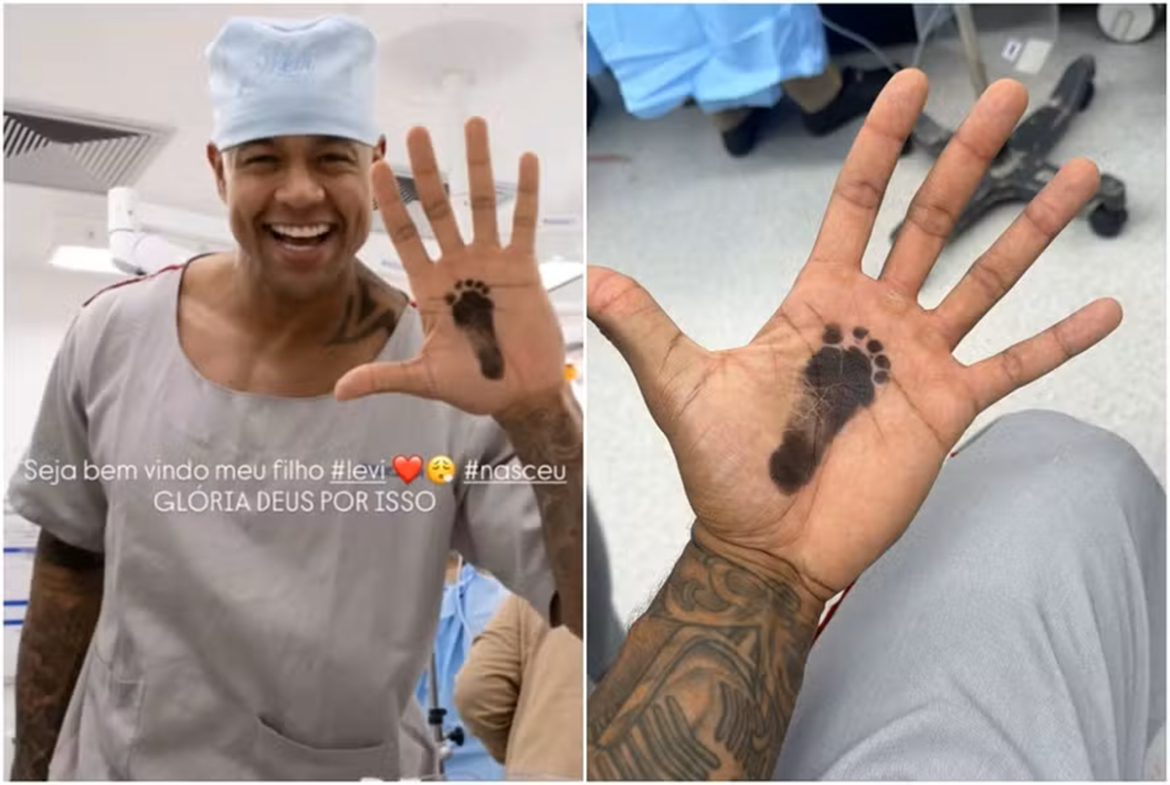Léo Santana exibe marca de pezinho de Levi na palma da mão usando traje cirúrgico azul em maternidade