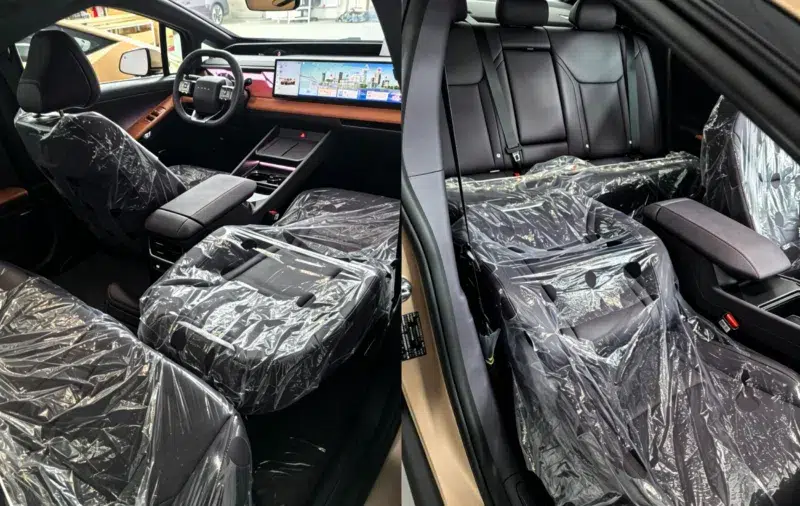 Hyundai Ioniq V 2026: SUV elétrico fastback com 800 V e portas sem moldura é flagrado na China 6 Bancos dianteiros e traseiros em couro preto do Ioniq V com plásticos de proteção e painel com tela panorâmica 4K